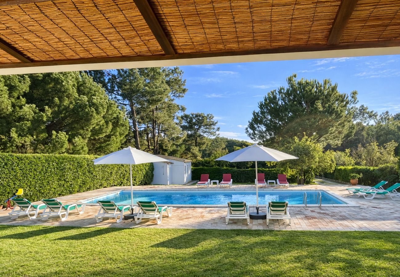  Private pool of a spacious villa in Vilamoura with garden and sun loungers
