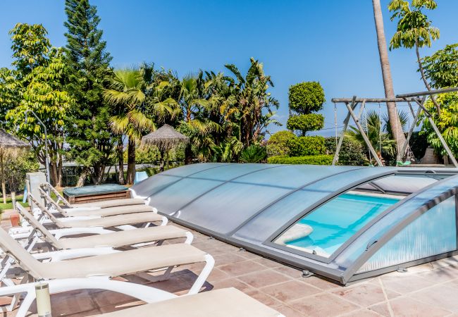 Villa with Heated Pool and Sauna | Cubo's Holiday Homes	 Heated pool of this villa in Alhaurín de la Torre