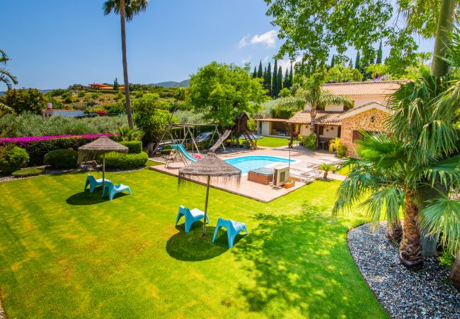 Villa with Heated Pool and Sauna | Cubo's Holiday Homes	 Heated pool of this villa in Alhaurín de la Torre