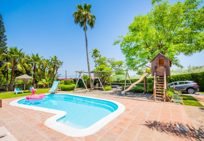 Villa with Heated Pool and Sauna | Cubo's Holiday Homes Heated pool of this villa in Alhaurín de la Torre
