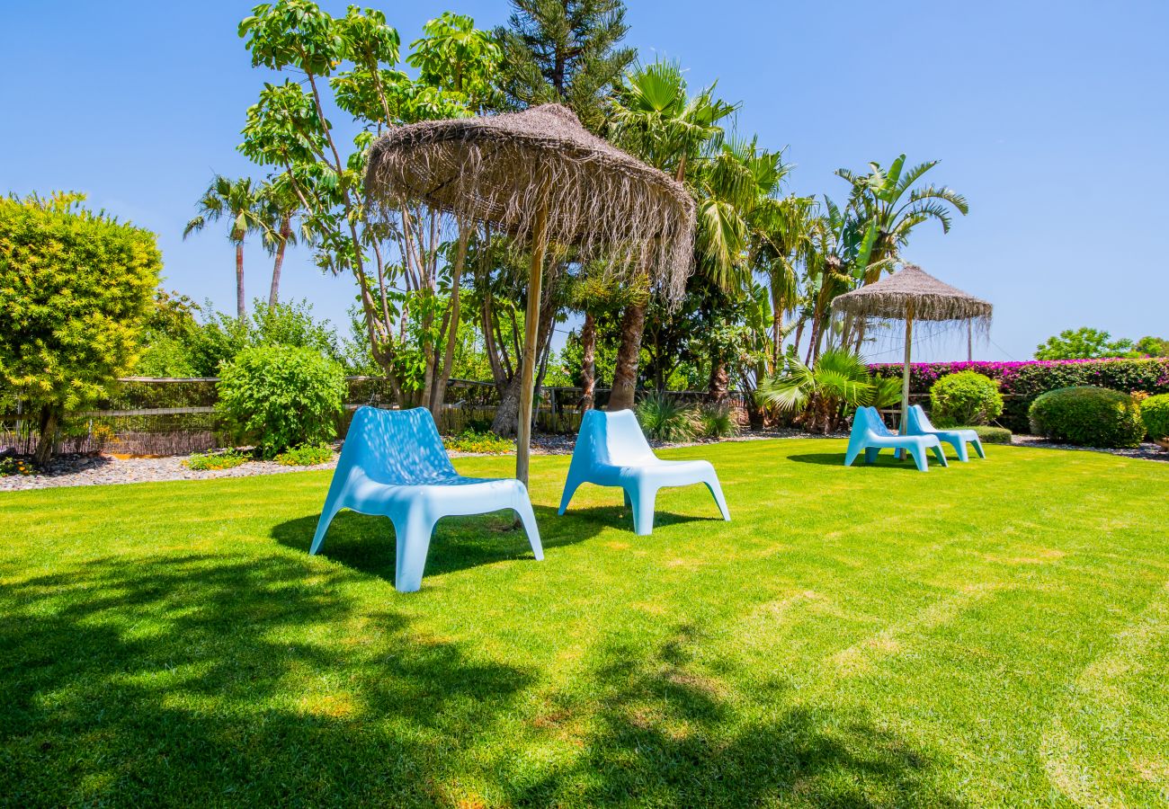 Villa with Heated Pool and Sauna | Cubo's Holiday Homes Garden of this villa in Alhaurín de la Torre